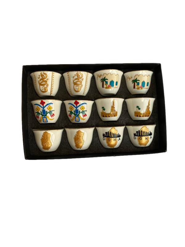 A group of Arabic coffee Qatar cups in different combinations that express the State of Qatar