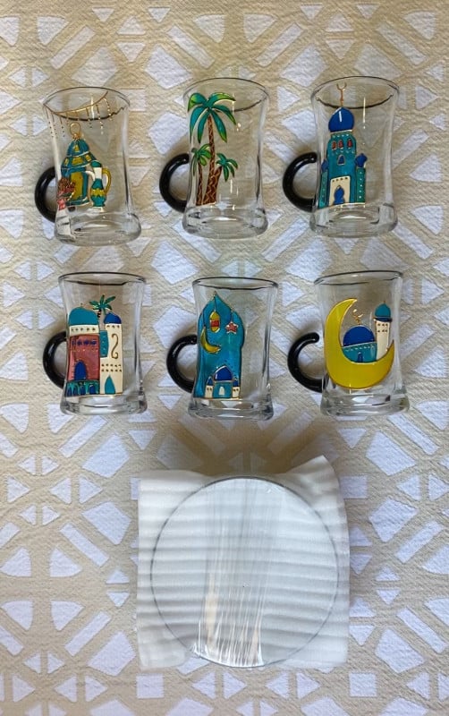 6 intricately designed glass tea cups