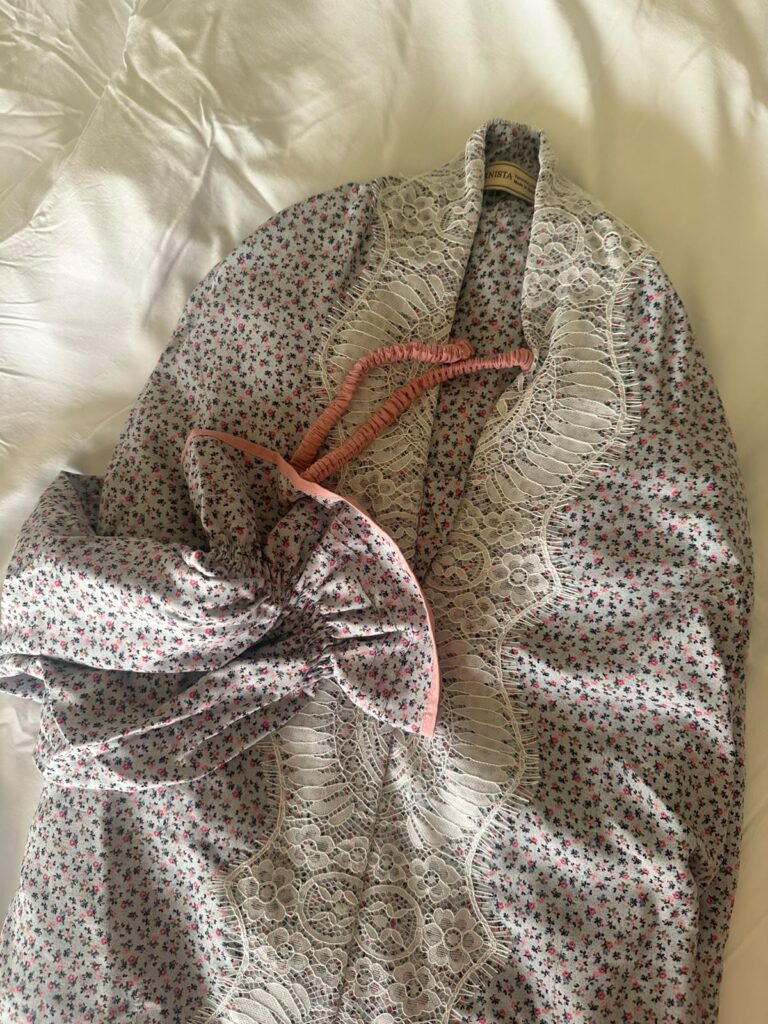 prayer dress with light blue baes and small flowers